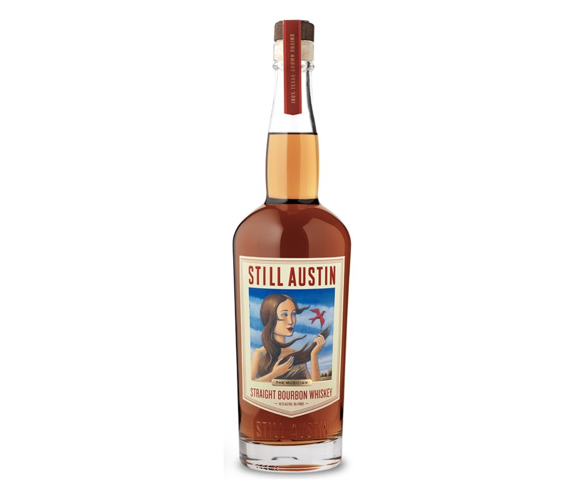 A bottle of Still Austin The Musician Straight Bourbon Whiskey