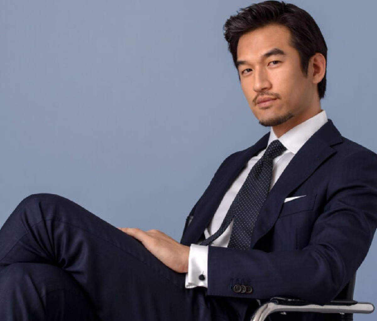 A man wearing a Proper Cloth suit.