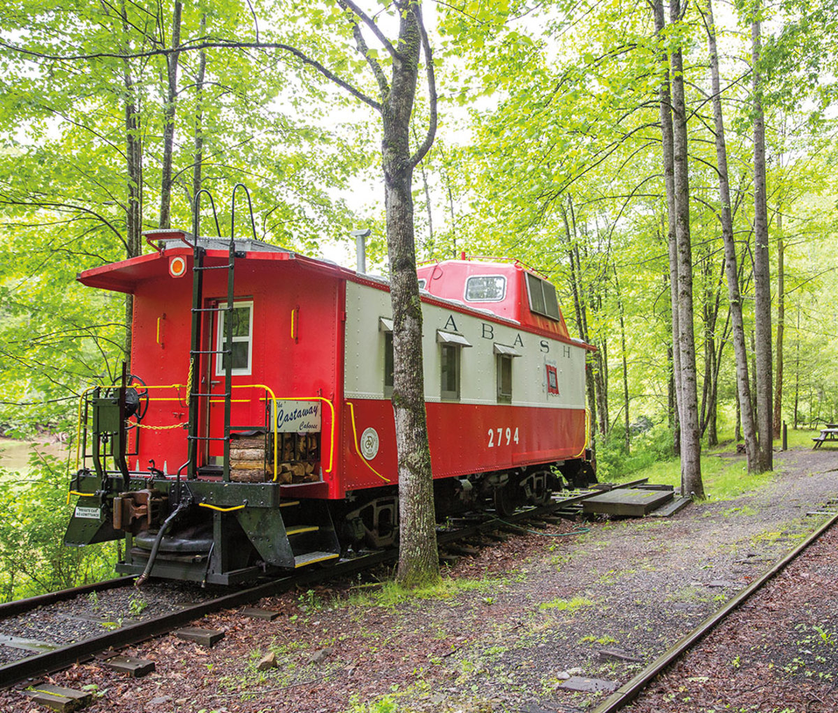 Train caboose in woods