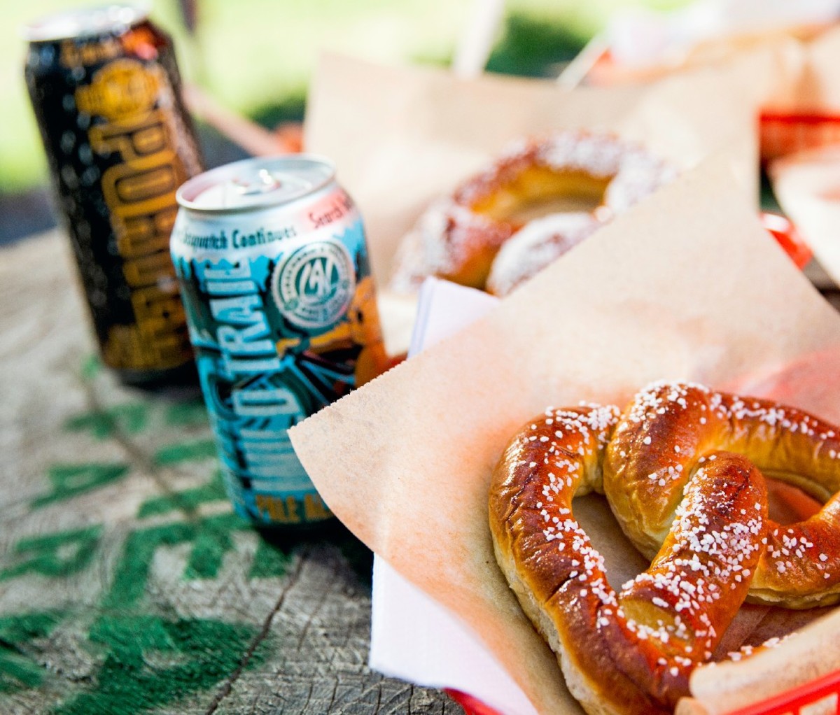 Can of Greenbrier Valley Brewing Co.'s Wild Trail Pail Ale beer next to a salted pretzel