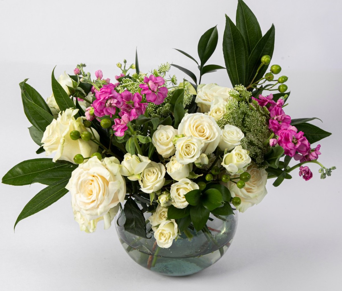 Bouquet of white and pink flowers in vase