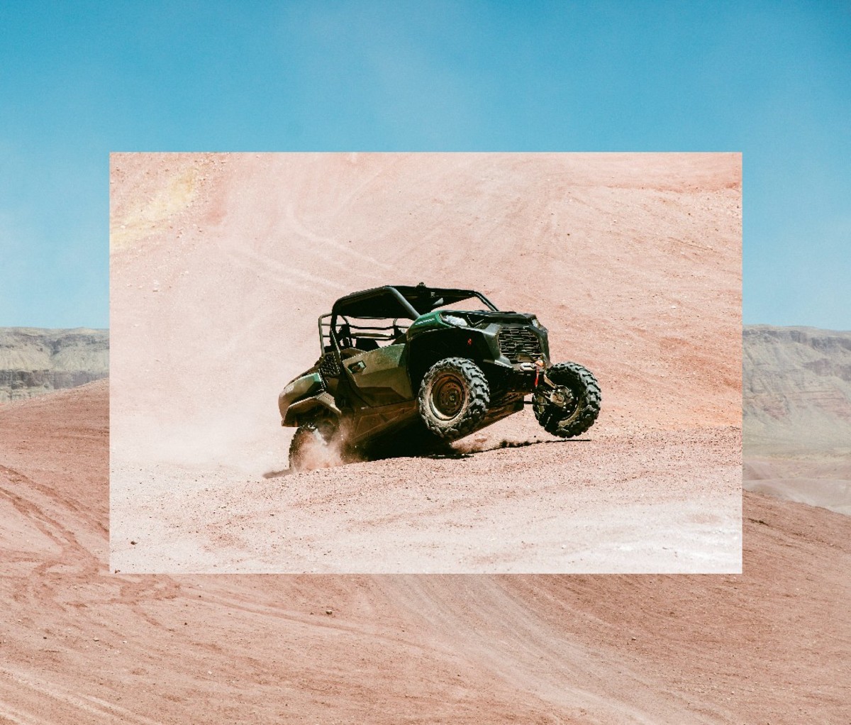 Riding side-by-side vehicle through sandy landscape in Zion