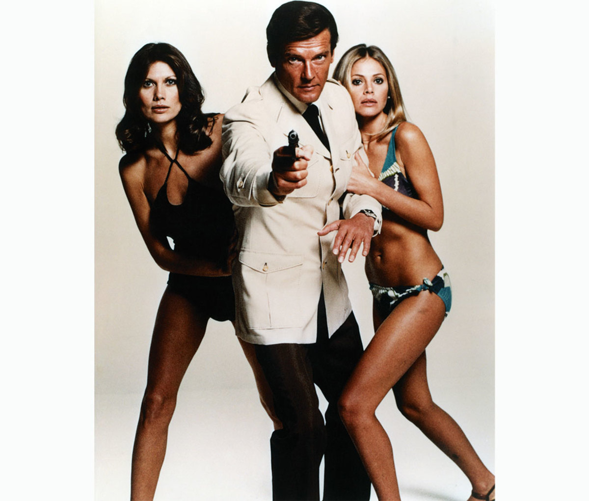 Maud Adams, Roger Moore, and Britt Ekland in 'The Man with the Golden Gun'