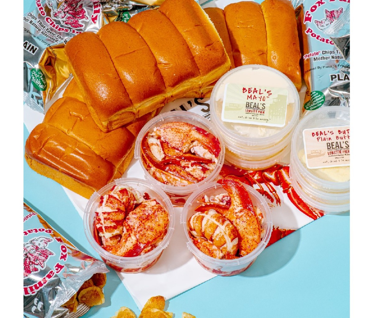 Goldbelly Subscriptions' display of lobster roll ingredients, including a row of buns, and several containers of fresh lobster