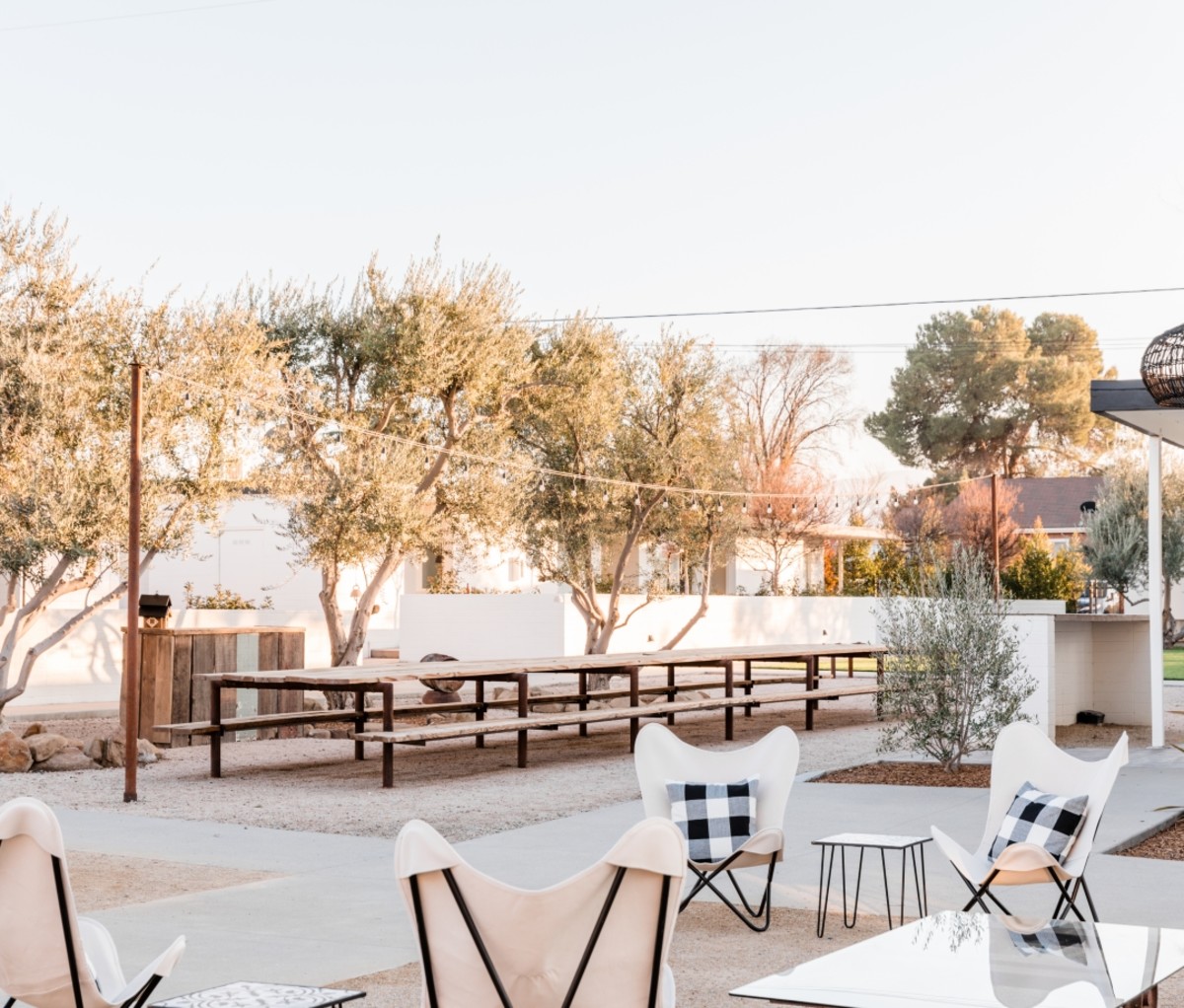 The patio and white chairs at the Cuyama Buckhorn hotel