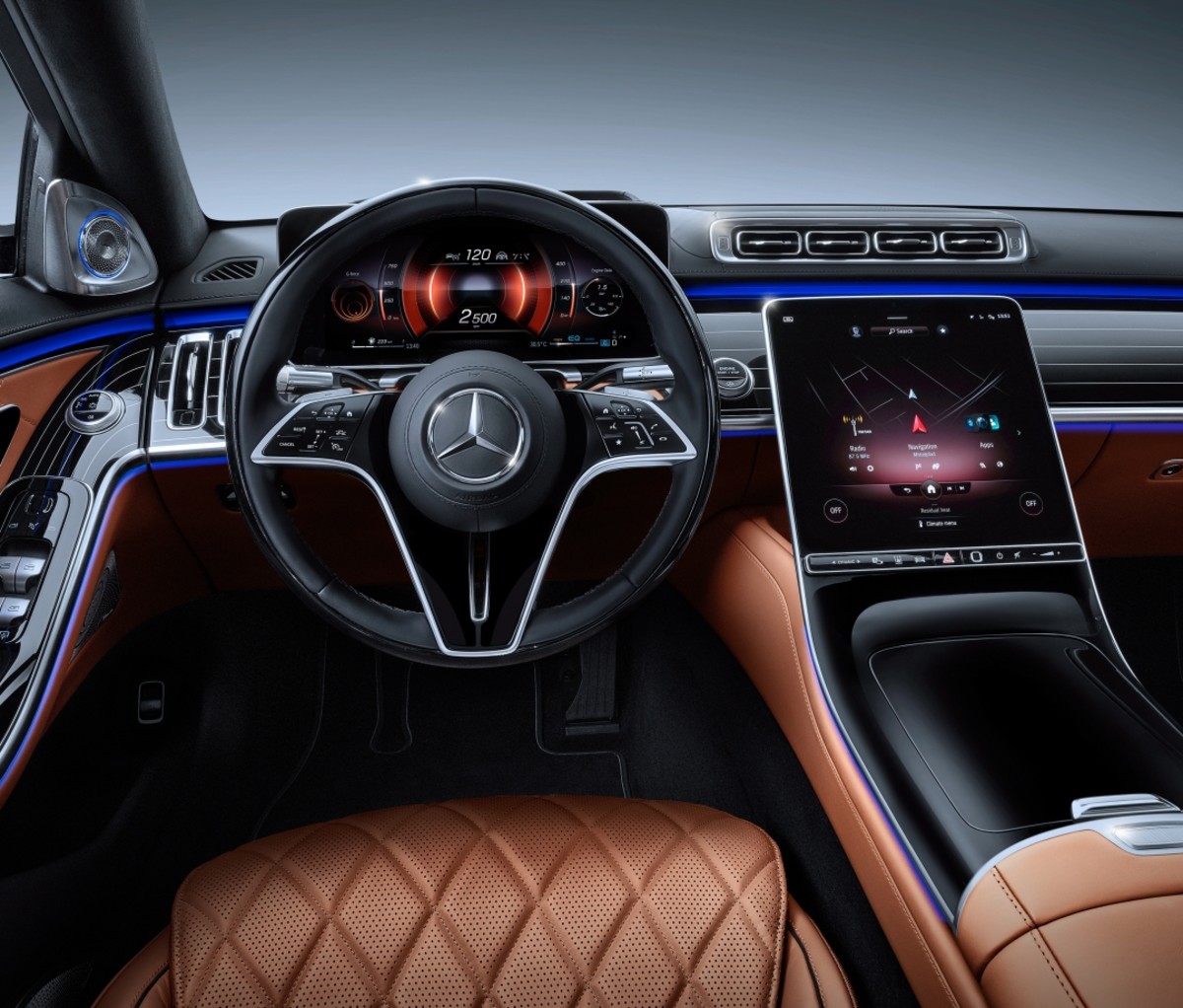 The steering wheel and digital gauge cluster on the Mercedes-Benz S-Class sedan