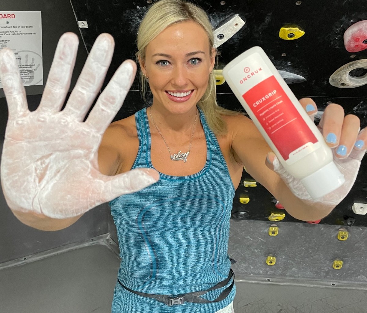 Pro climber and OnCrux athlete Sierra Blair-Coyle shows off a chalked hand