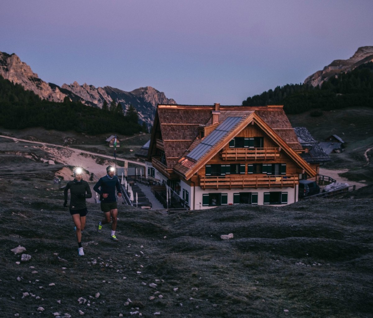 Trail runners at dusk