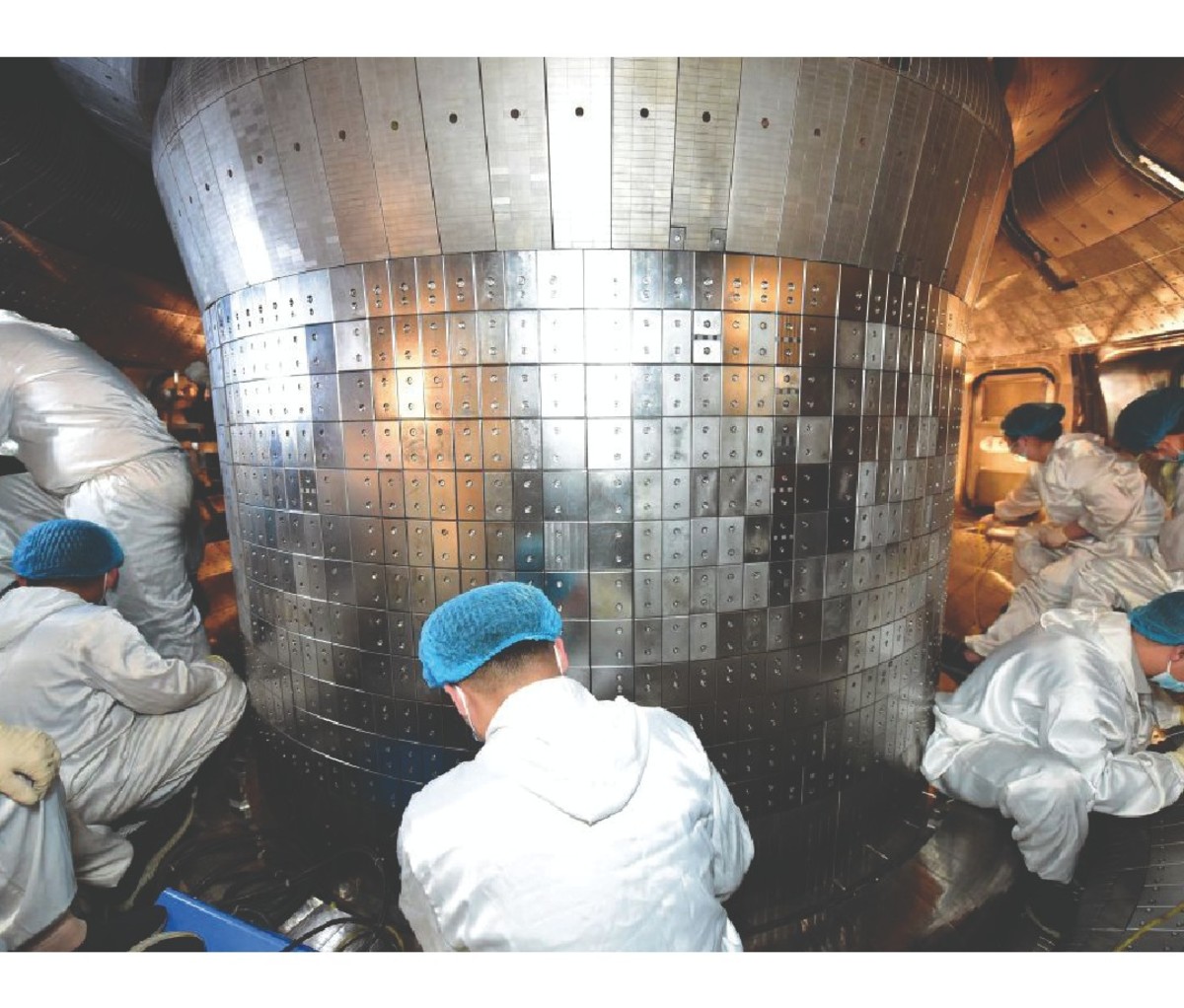 Scientists working on nuclear reactor