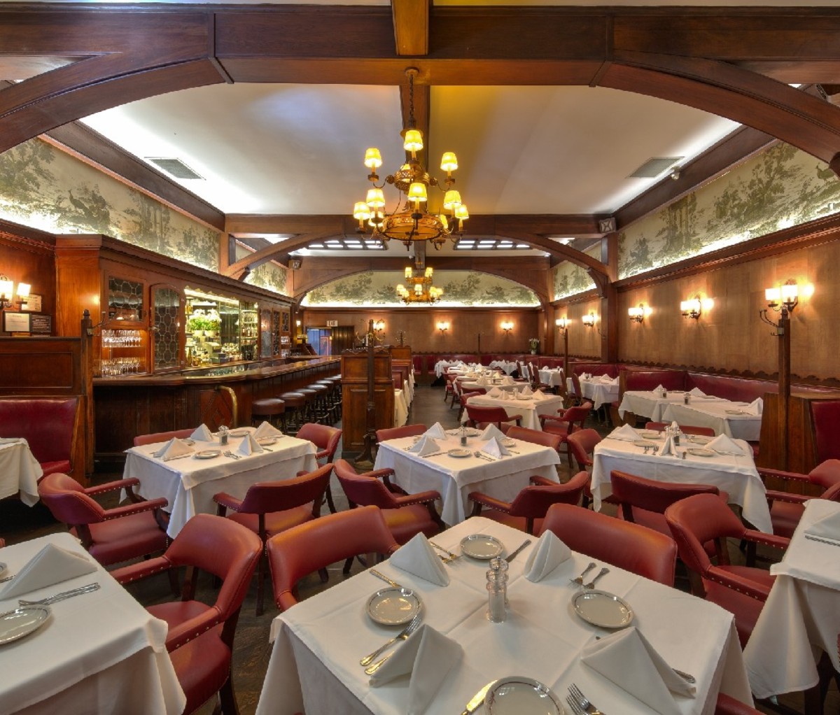 Interior of fine-dining restaurant with white table cloths