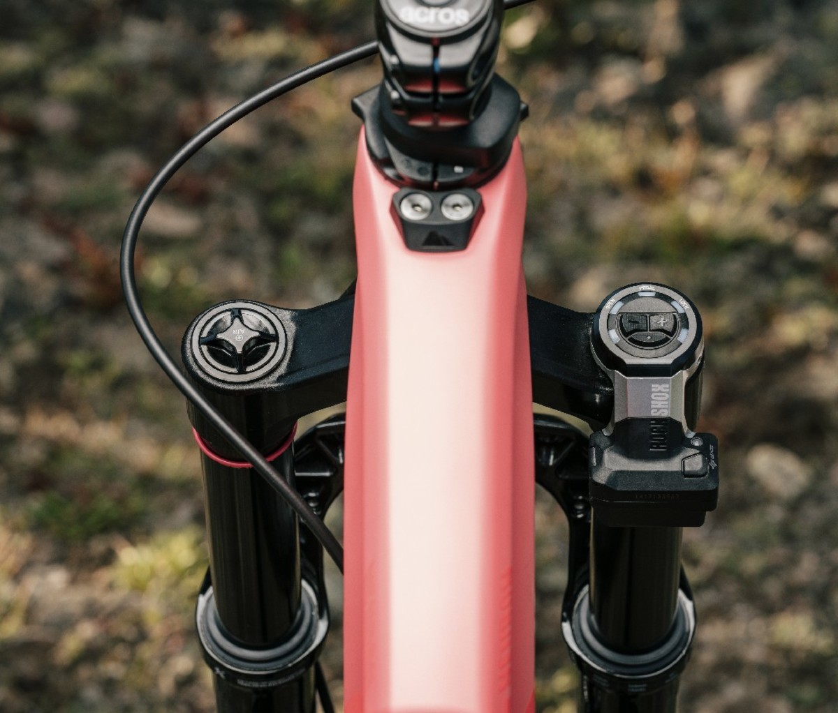 Red bike with shock absorbers and sensors