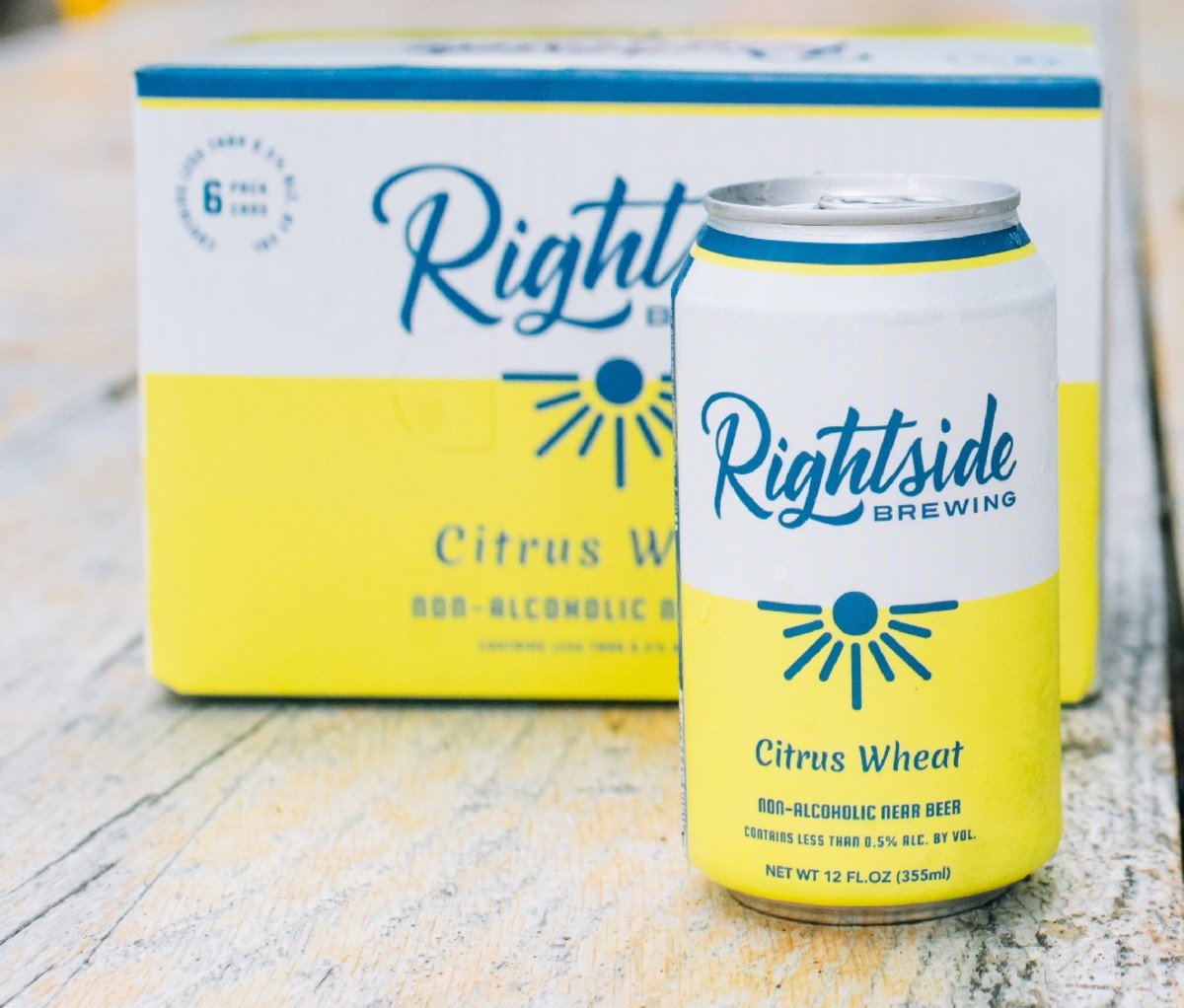 Can and case of Rightside Brewing Citrus Wheat nonalcoholic beer