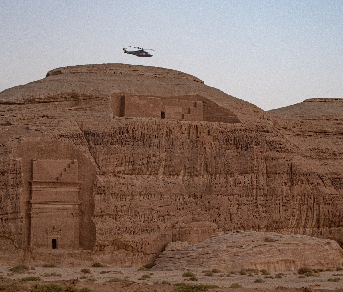 Helicopter flies over UNESCO World Heritage Site of Hegra near city of AlUla in Saudi Arabia