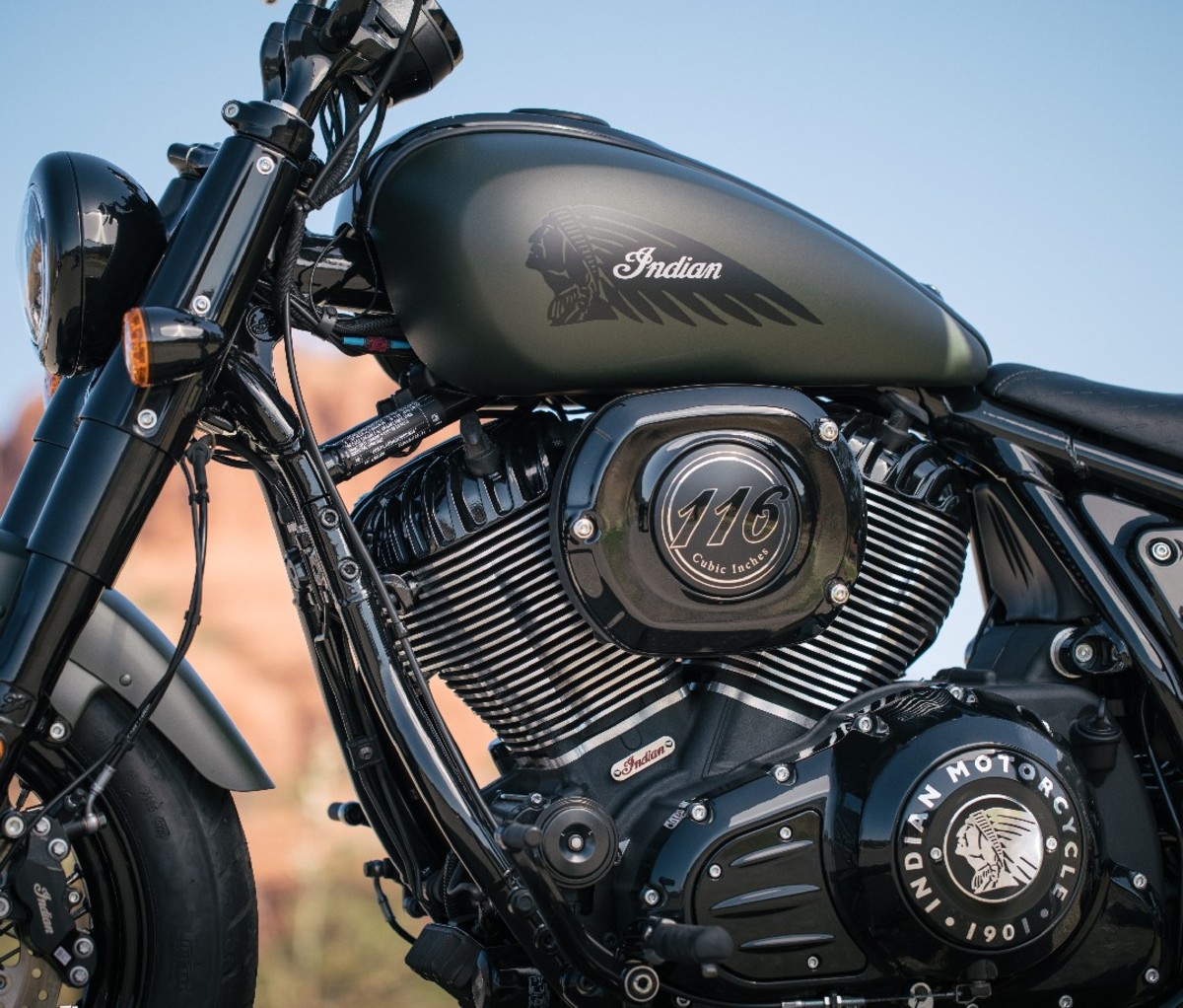 Closeup profile of 2022 Indian Chief Bobber motorcycle's gas tank, engine and front fork