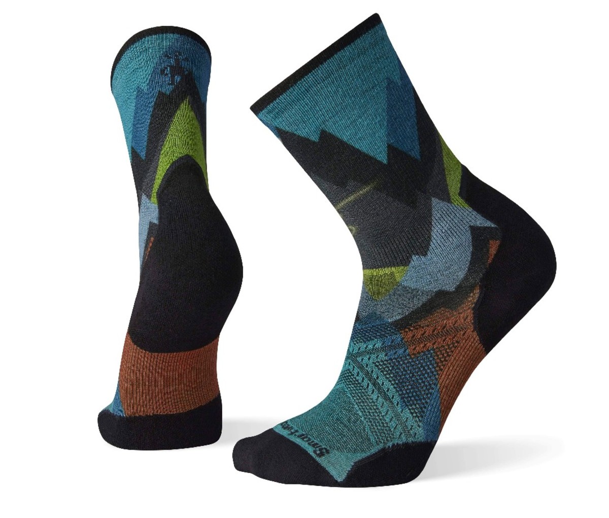 Black and dark-blue based pair of Smartwool Athlete Edition Run Mountain Print Crew Socks
