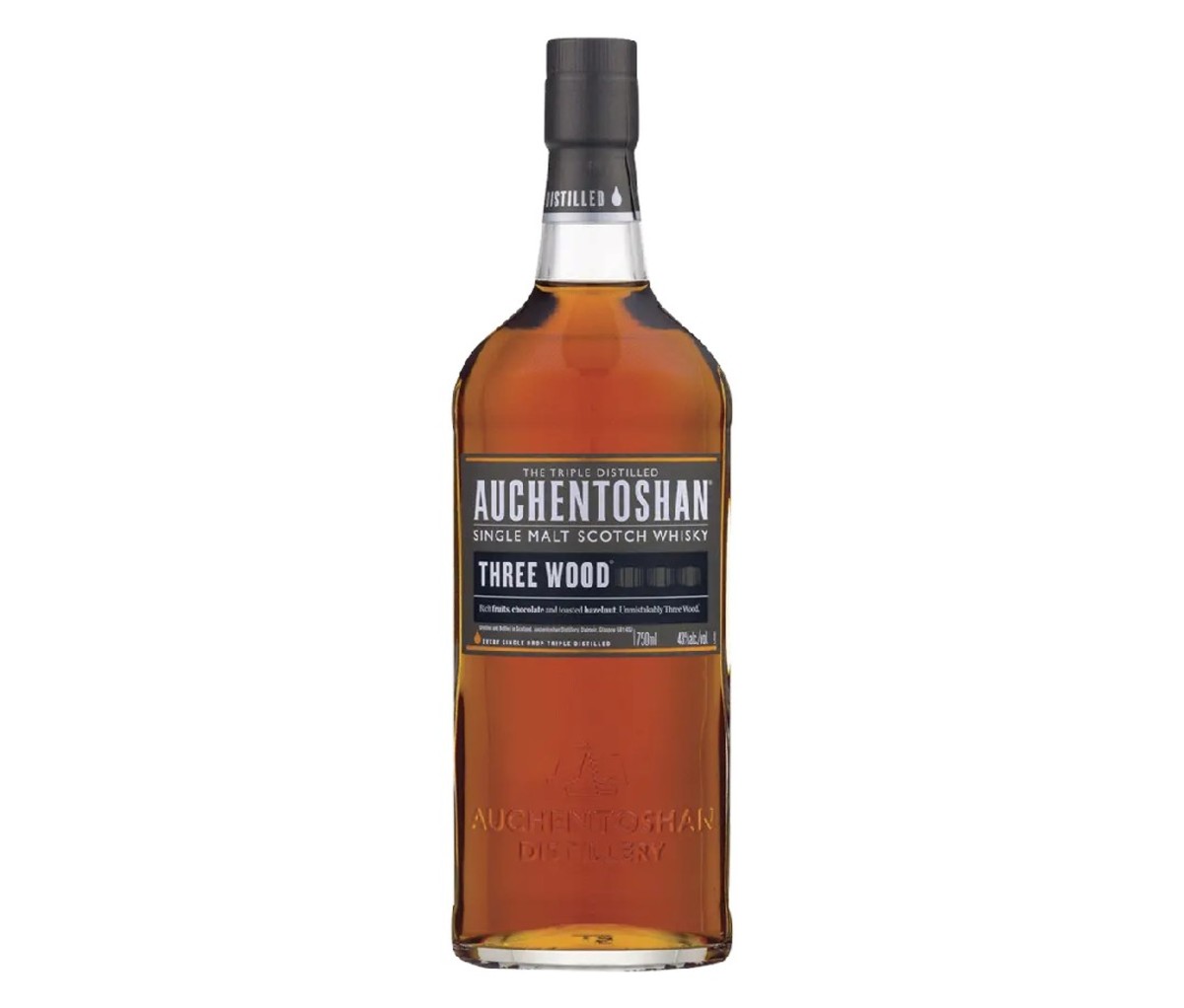 A bottle of Auchentoshan Three Wood whisky.