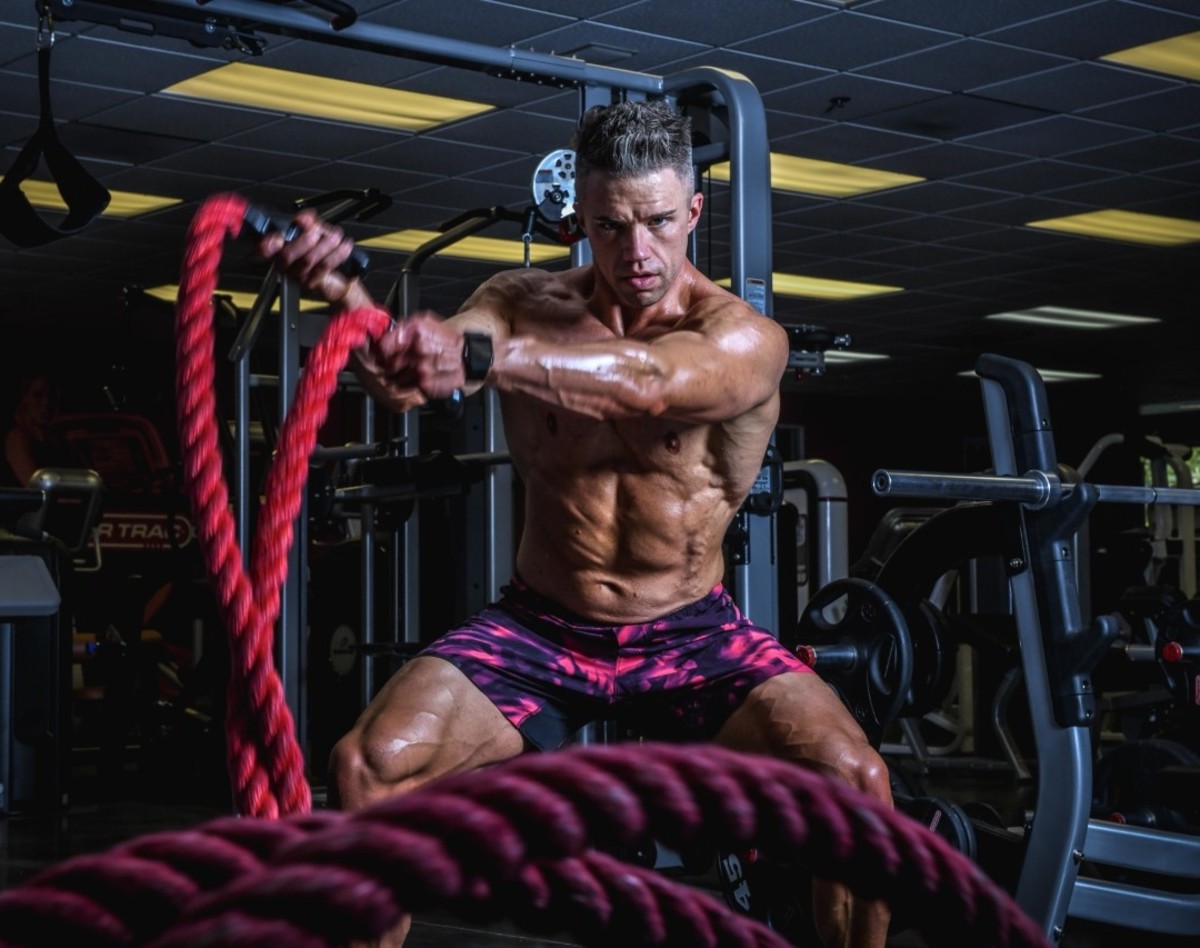 Eric Thomson using workout ropes in the gym