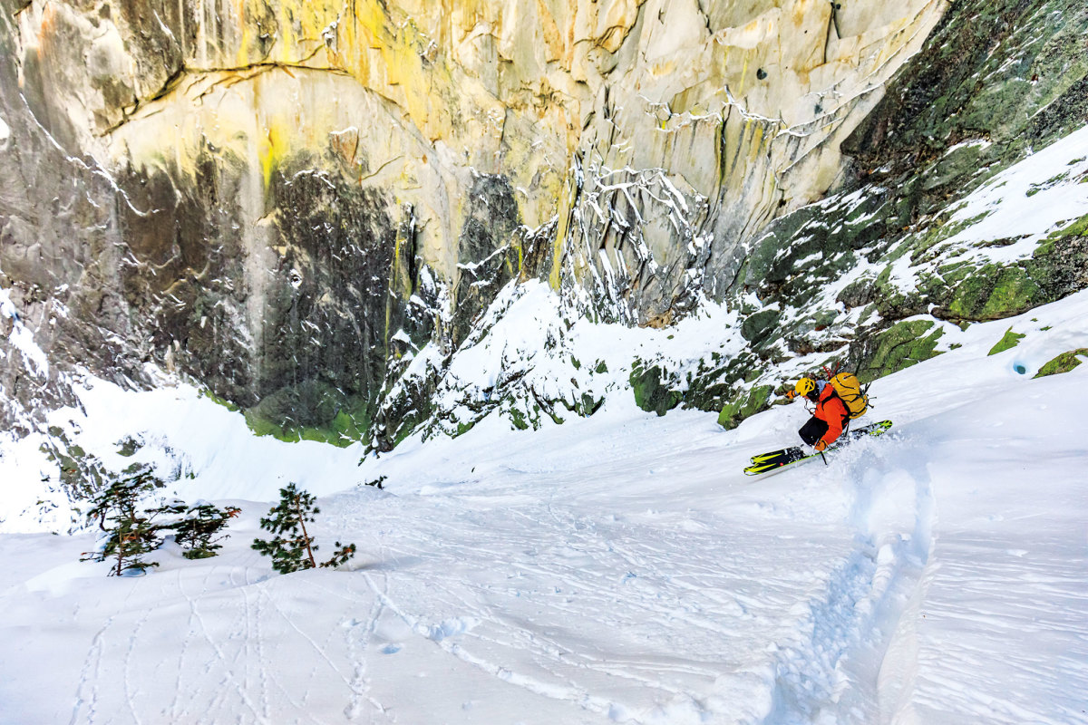 Skiing down steep line at Half Dome in Yosemite.