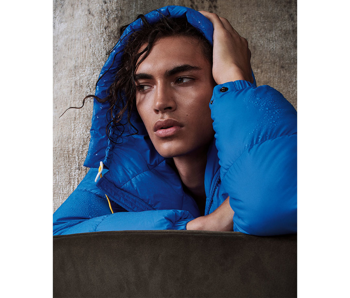 Man wearing blue parka jacket