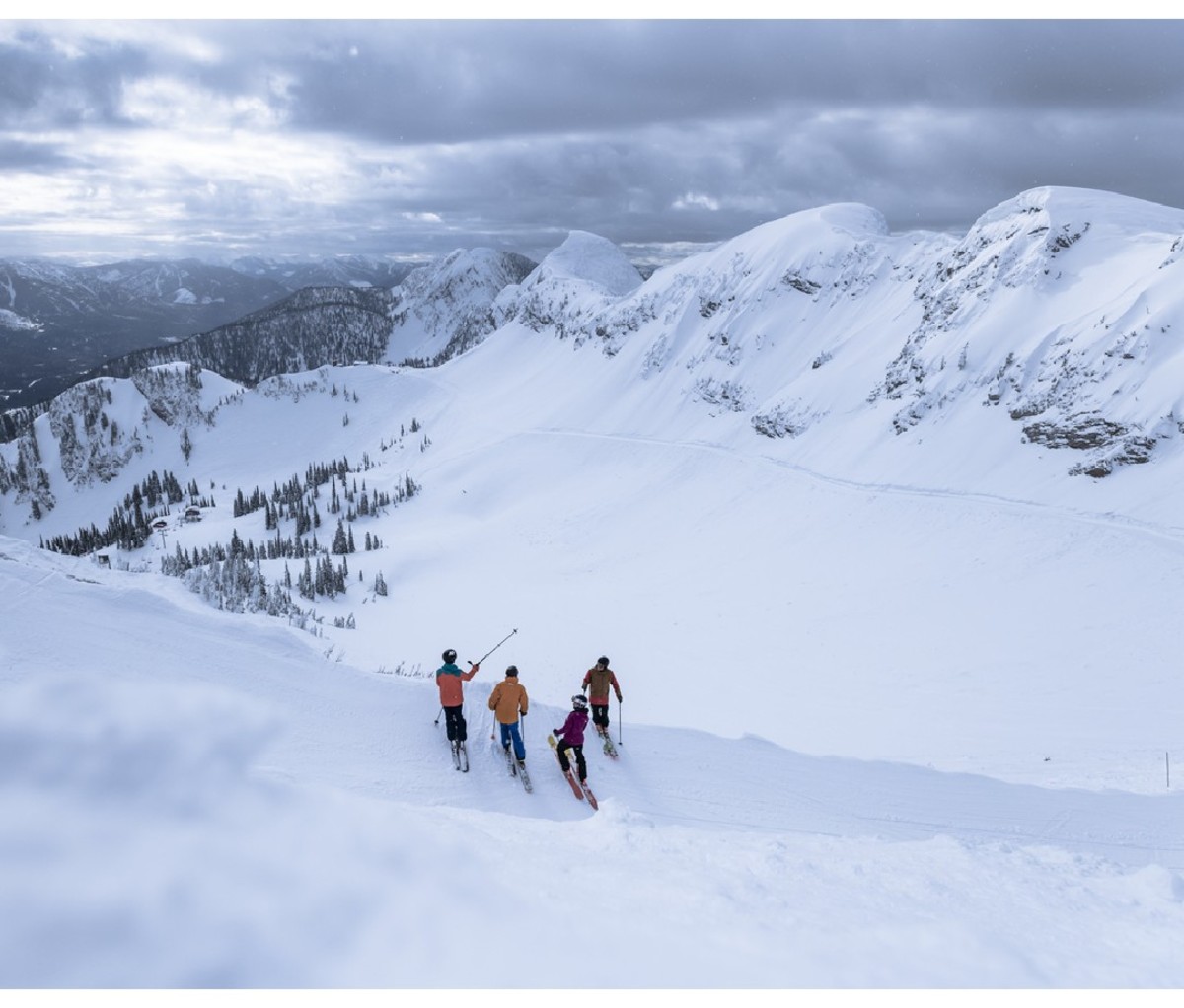Group of four skiers on the mountain at Fernie Alpine Resort.