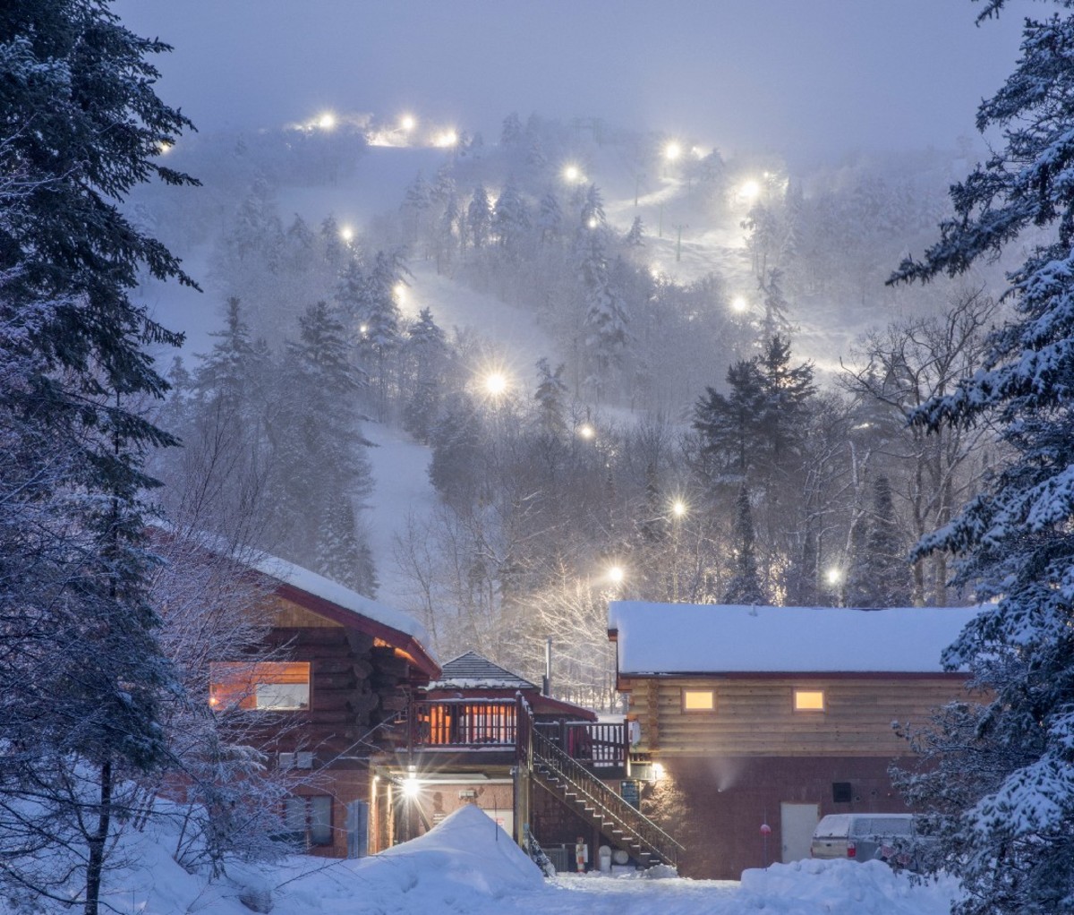 Night skiing lights in the evening from the base of Mount Bohemia Ski Resort