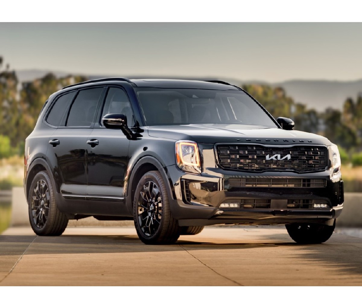 Front of black 2022 Kia Telluride parked on a road