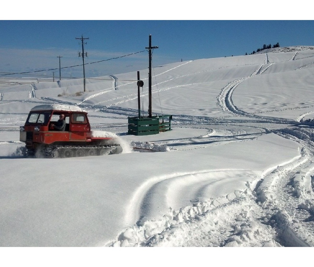 Old-school snow cat grooming the hill at Badger Mountain Ski Area: Waterville, WA