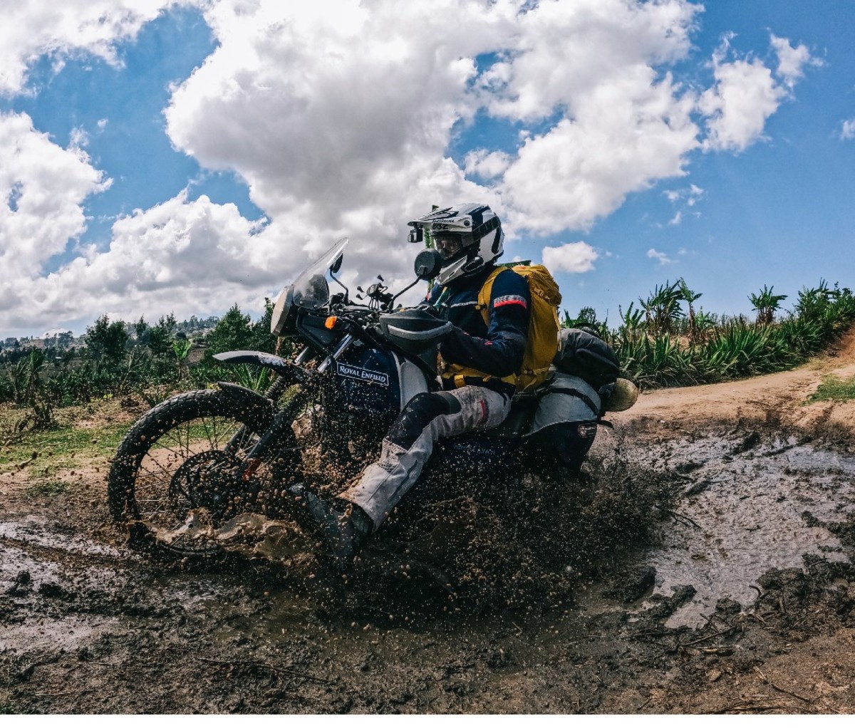 Motorcyclist throttles himself out of the mud on the Kili-Cape Town trail in Africa