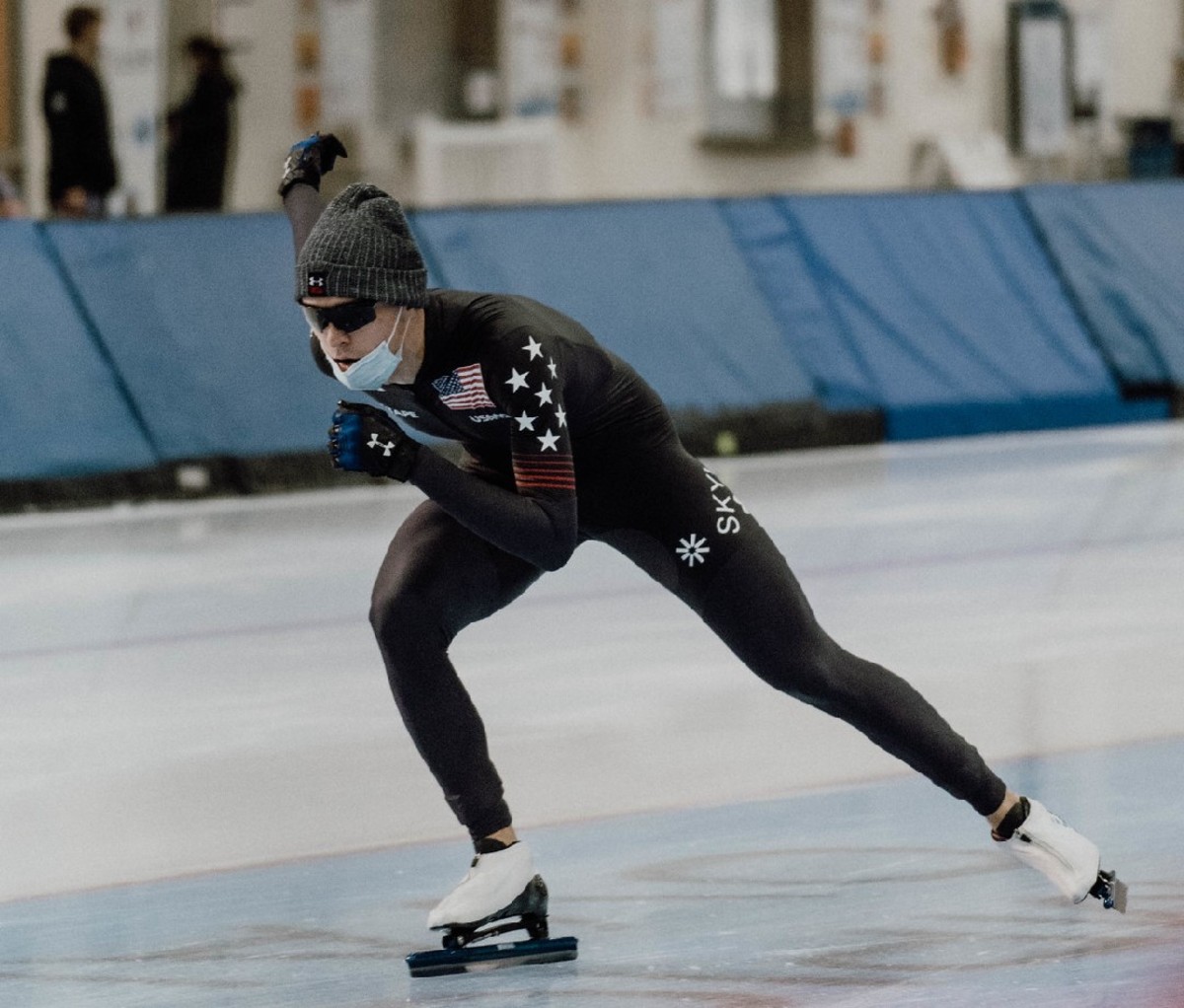 Team USA speed skater Conor McDermott-Mostowy in mid-stride on the ice