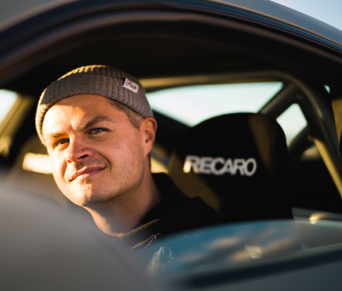 Portrait of man in a car taking with the Leica M11 camera