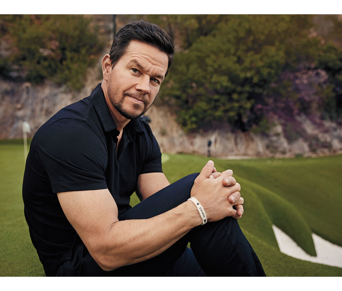 Actor Mark Wahlberg poses on golf course