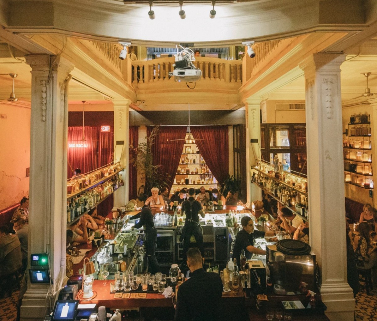 Alquimico bar viewed from above with white columns in the foreground