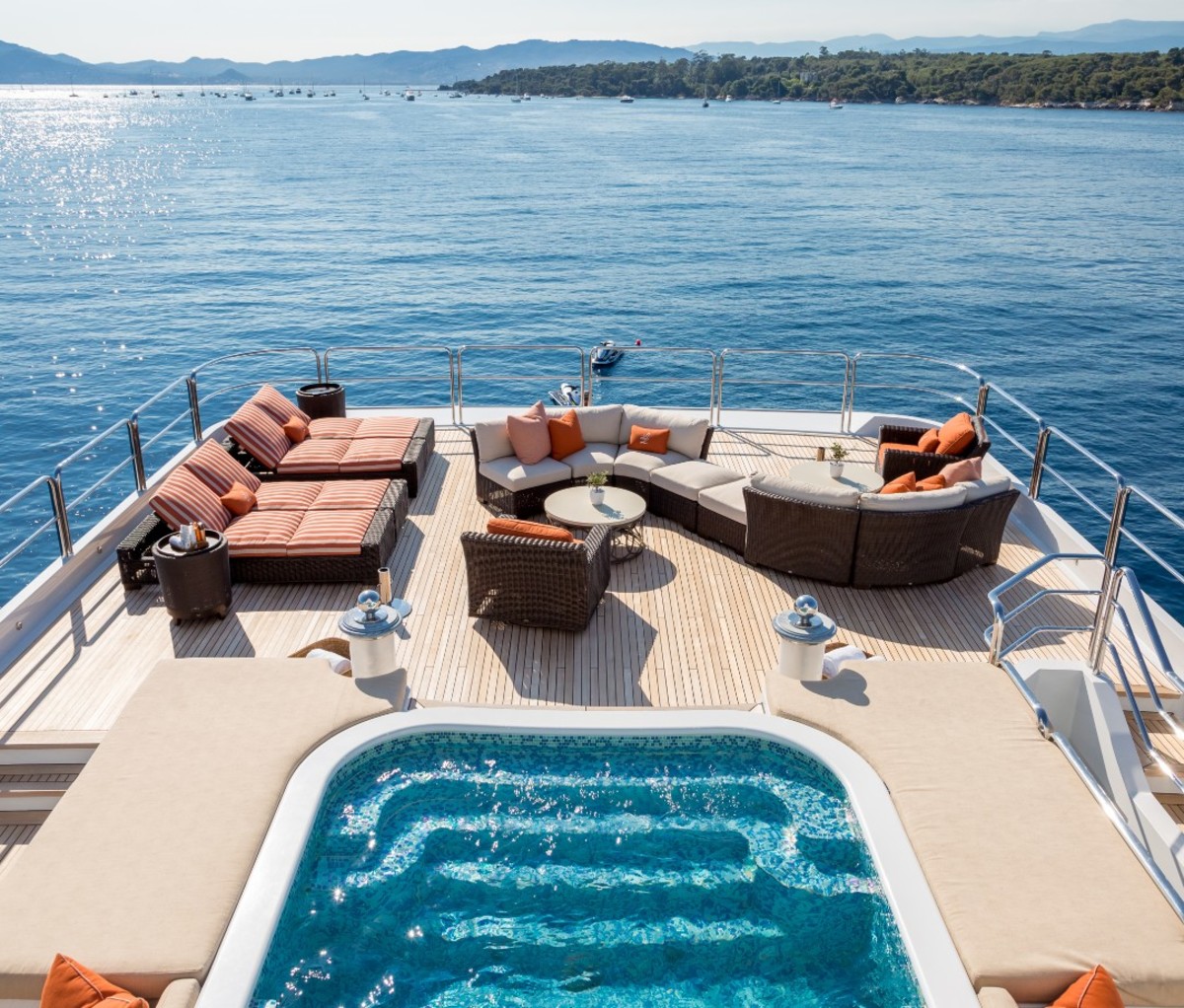 Yacht deck with hot tub and sun loungers