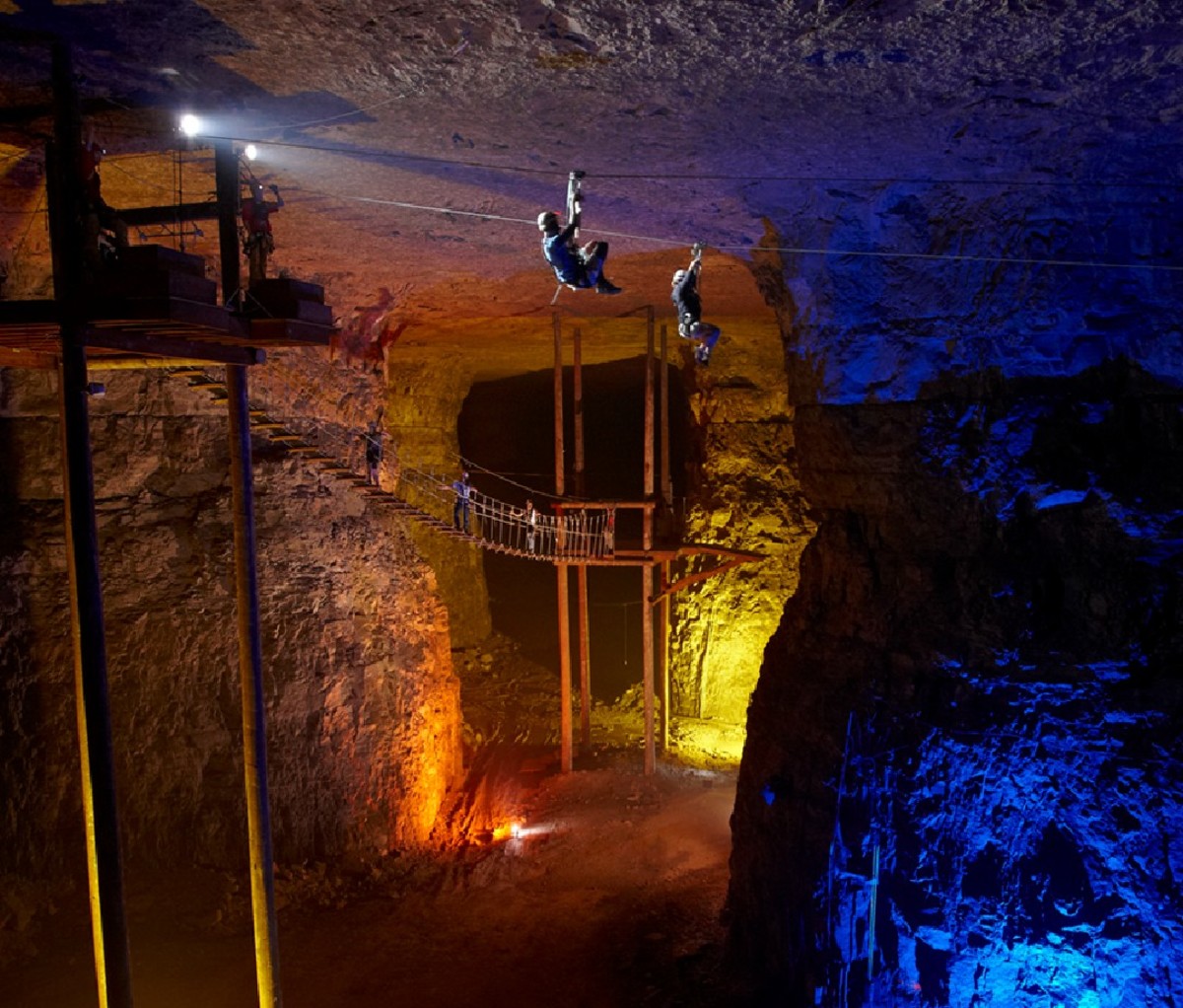 Zip-liners riding the underground zip-line course at Louisville Mega Cavern in Louisville, KY