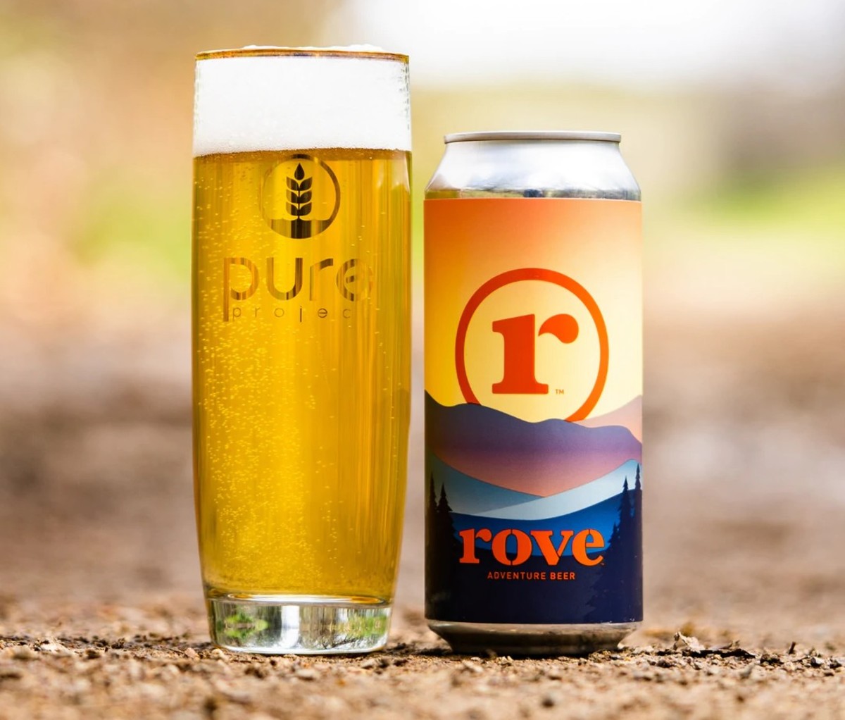 Can of Rove Adventure Beer beside a tall pint glass.
