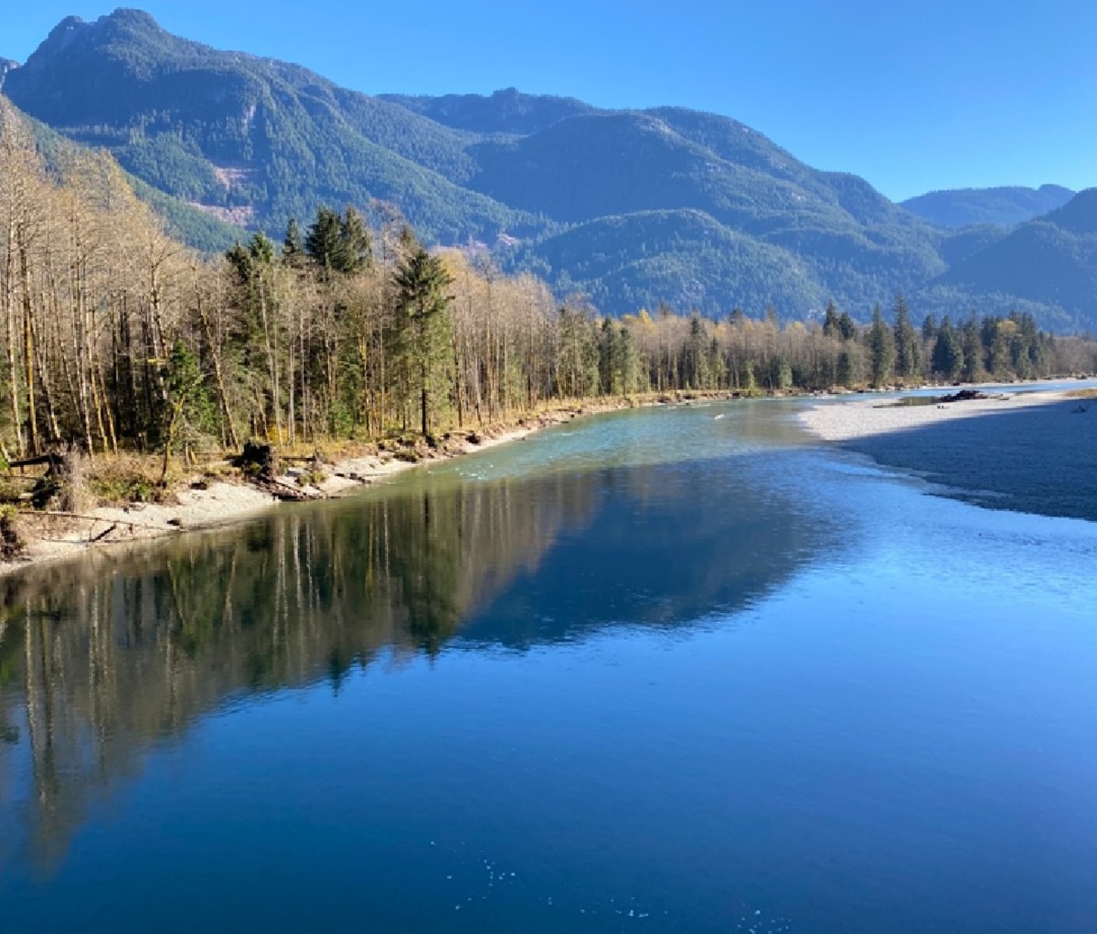 Glass lake and hills on the Pitt River Watershed in B.C., Canada