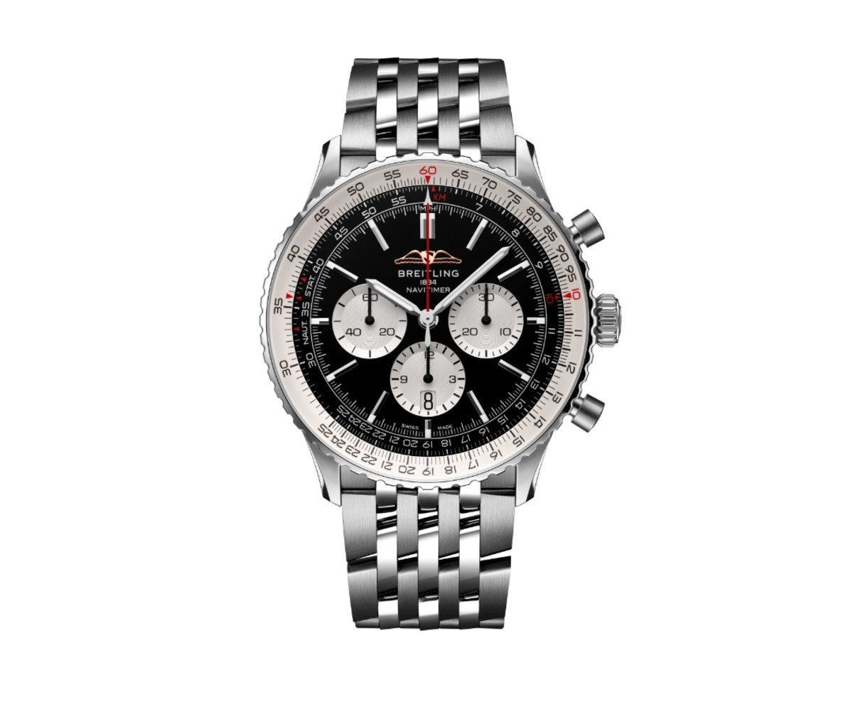 A Breitling Navitimer watch with a stainless steel bracelet on a white background
