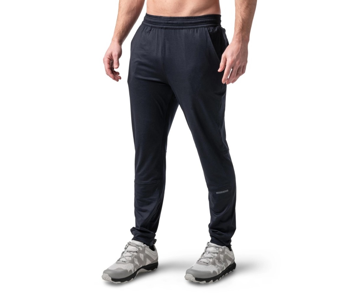 Shirtless man wearing jogger pants