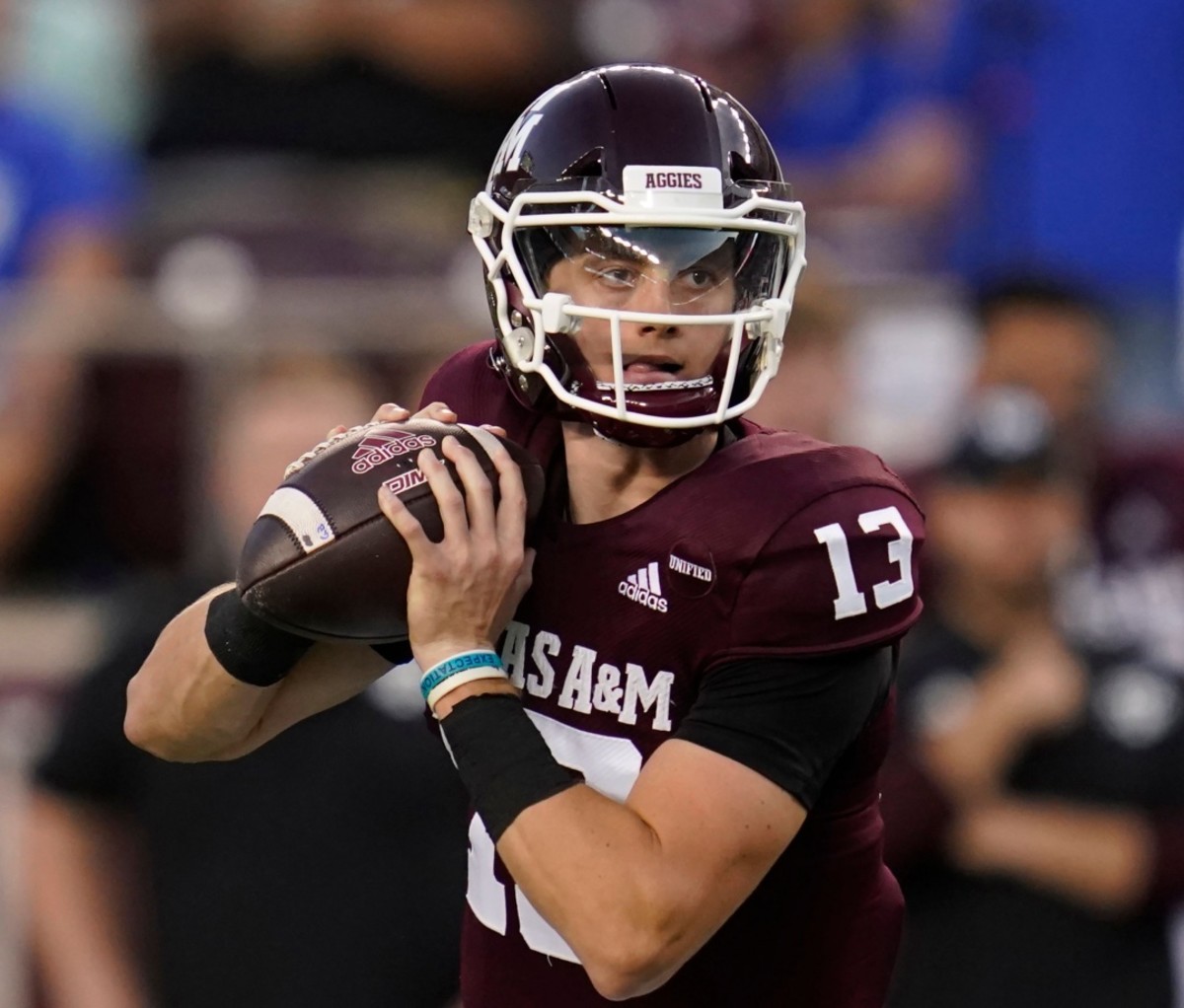 Texas A&M quarterback Haynes King holds the ball ready to pass during a college football game