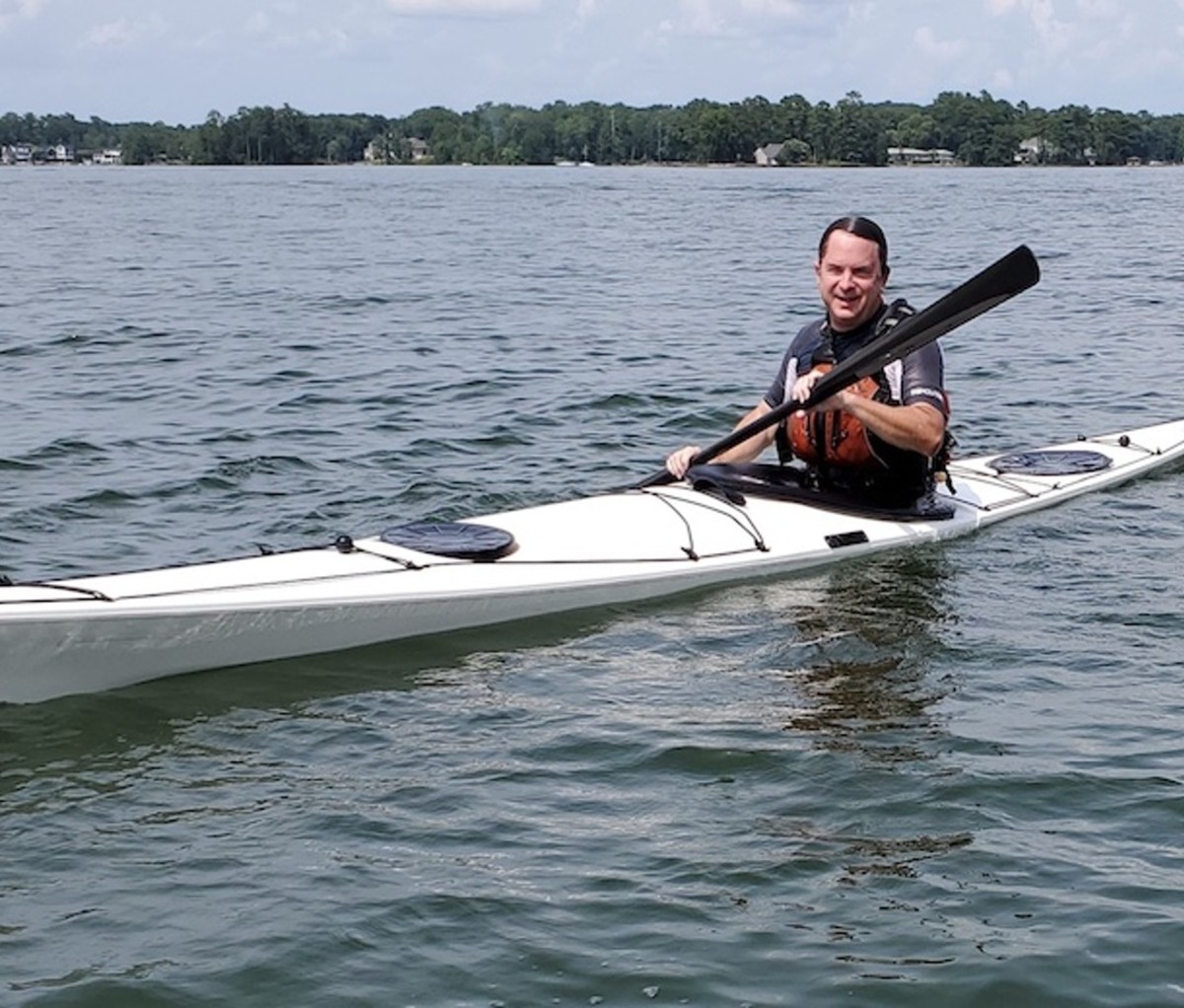 Lone Kayaker Saves Two Men From Sinking Motorboat