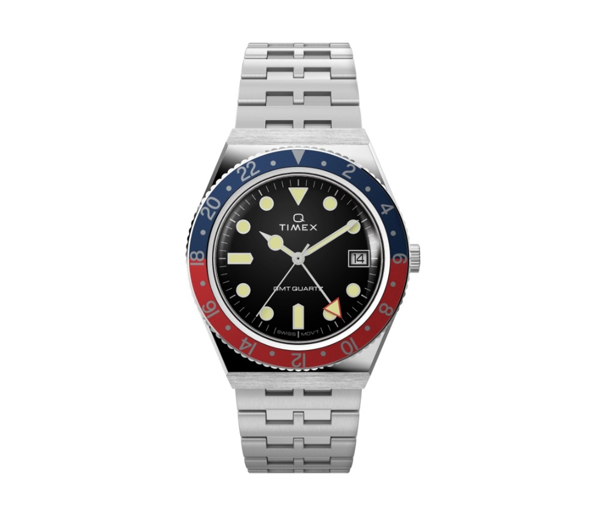 Q Timex GMT Watch with a red and blue bezel on a white background