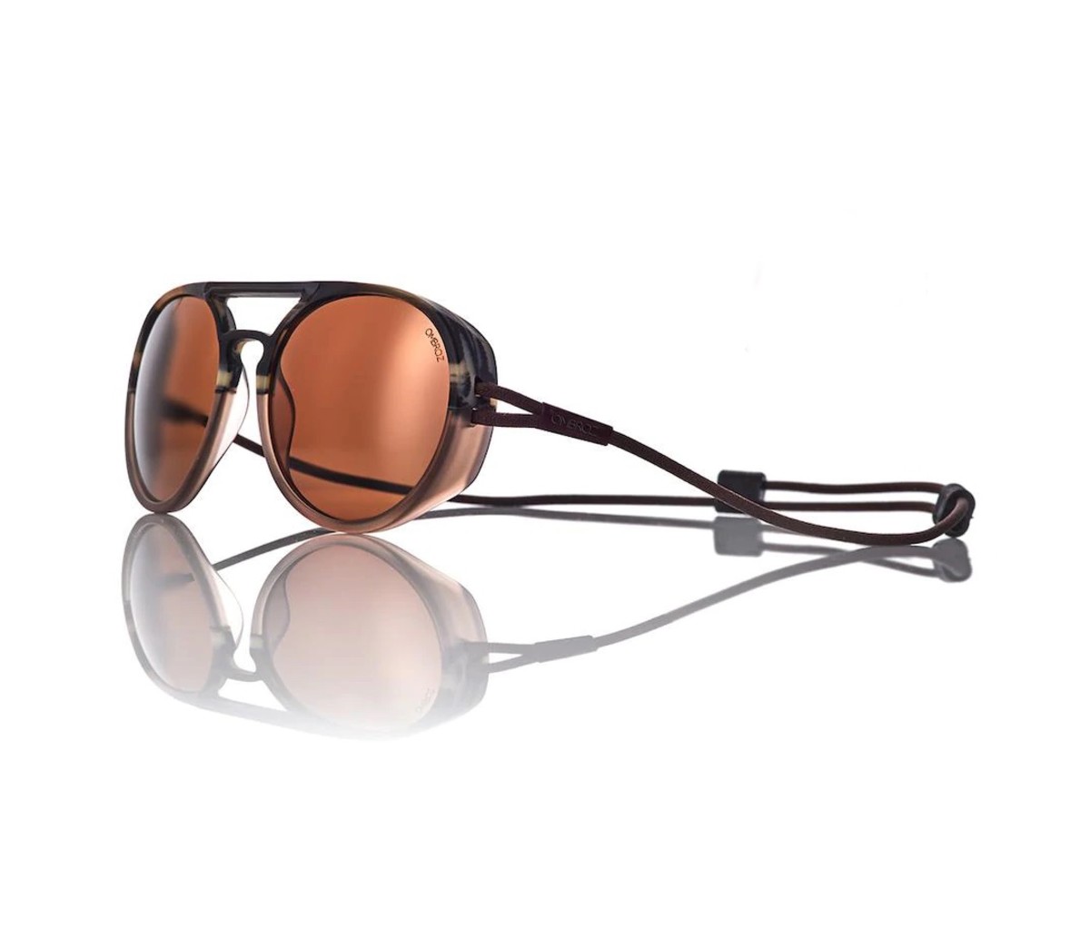 The unique Ombraz sunglasses eschew temples for tight-fitting bungee cord.