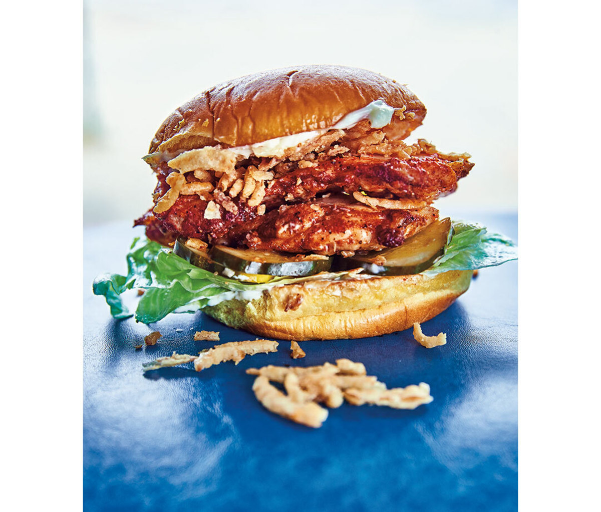 Spicy fried chicken sandwich on potato roll