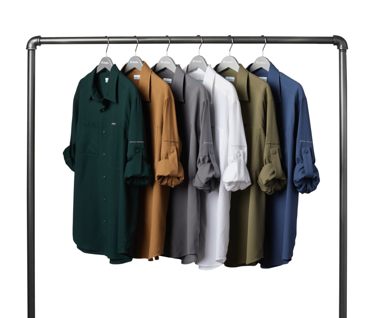 Columbia Silver Ridge shirts on hangers on a rack on a white background.