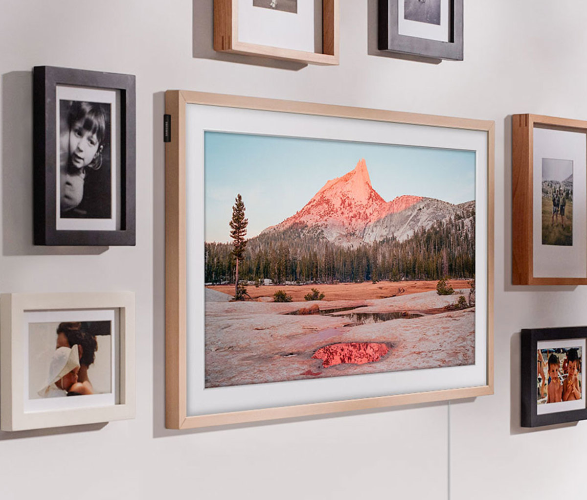 Gallery wall of images in varying frame sizes