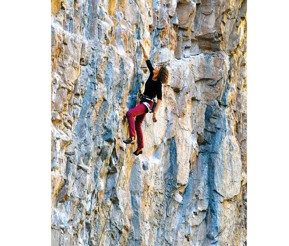 Woman rock climbing