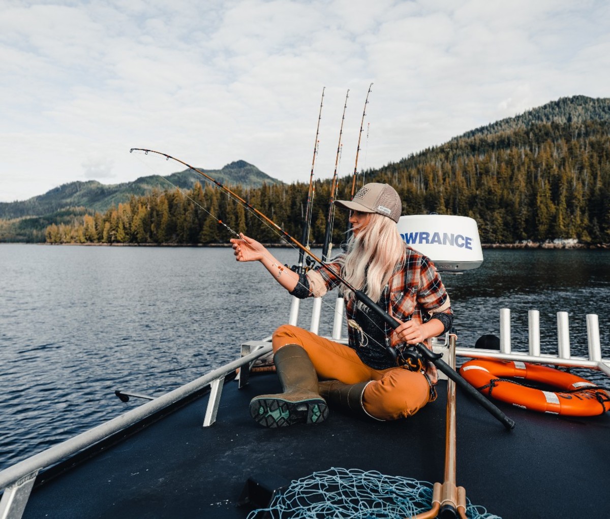 A woman fishing in Alaska