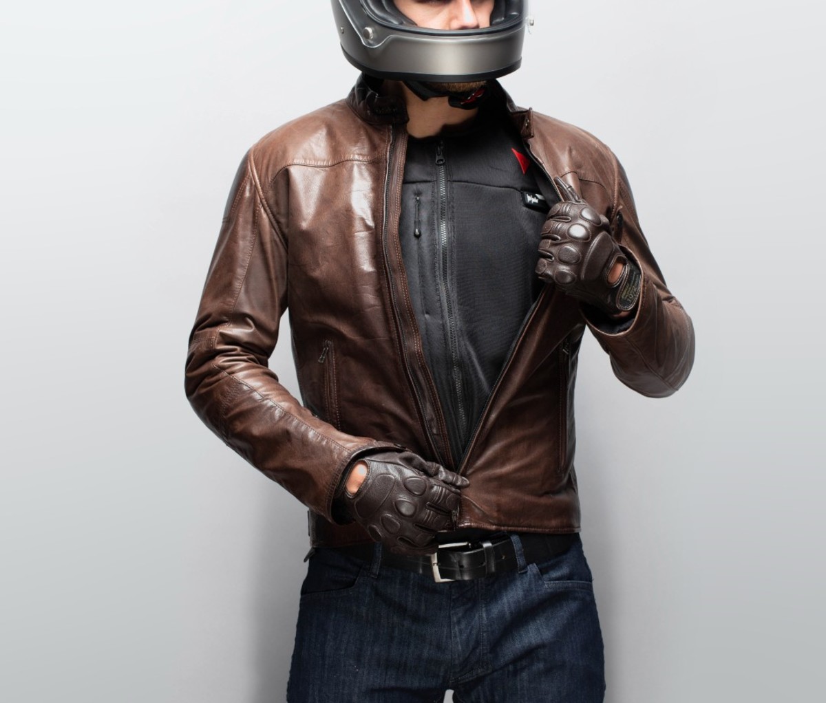 Motorcyclist wearing brown leather jacket