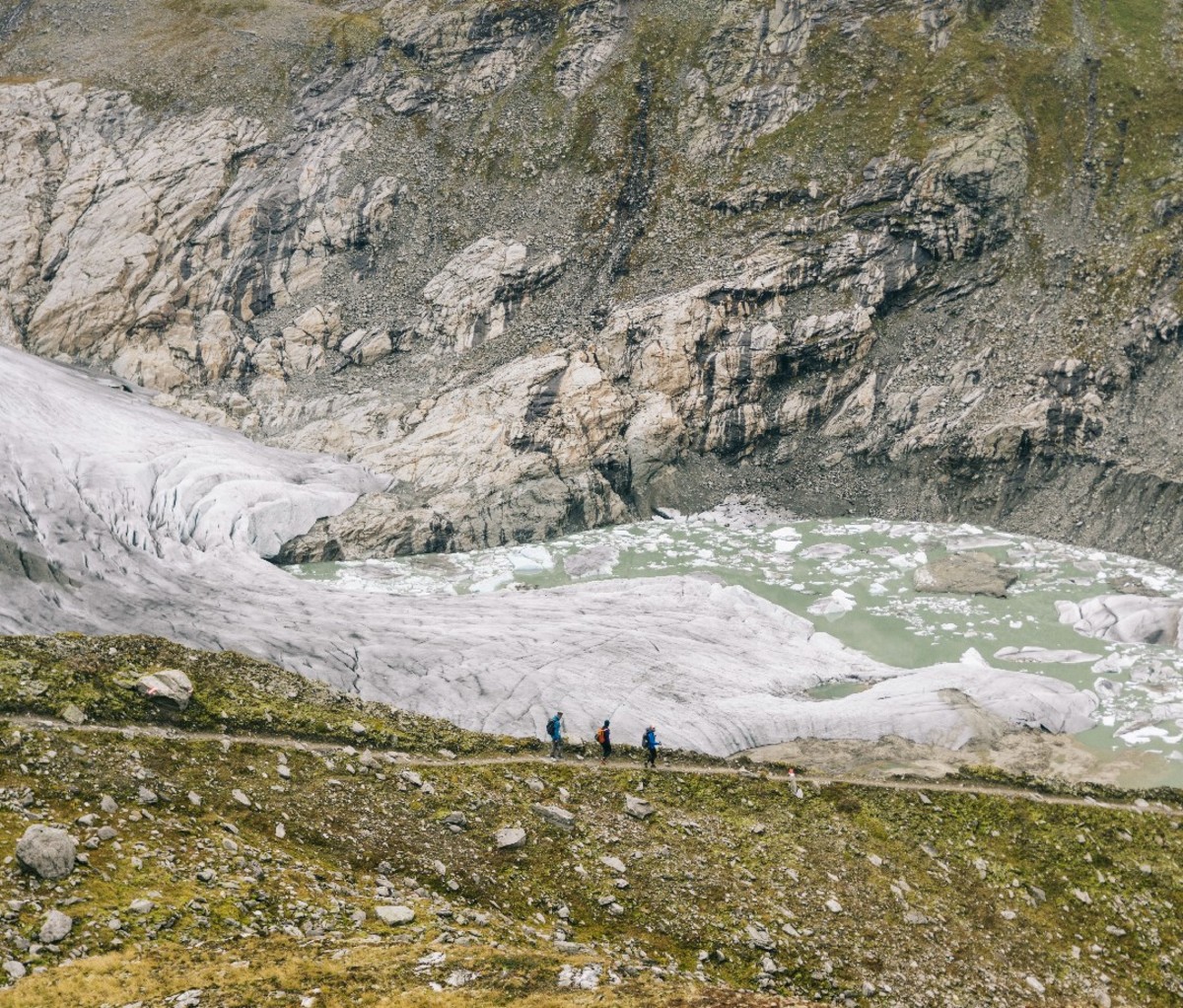 Hikers walking along a trail on Austria's Eagle Way.