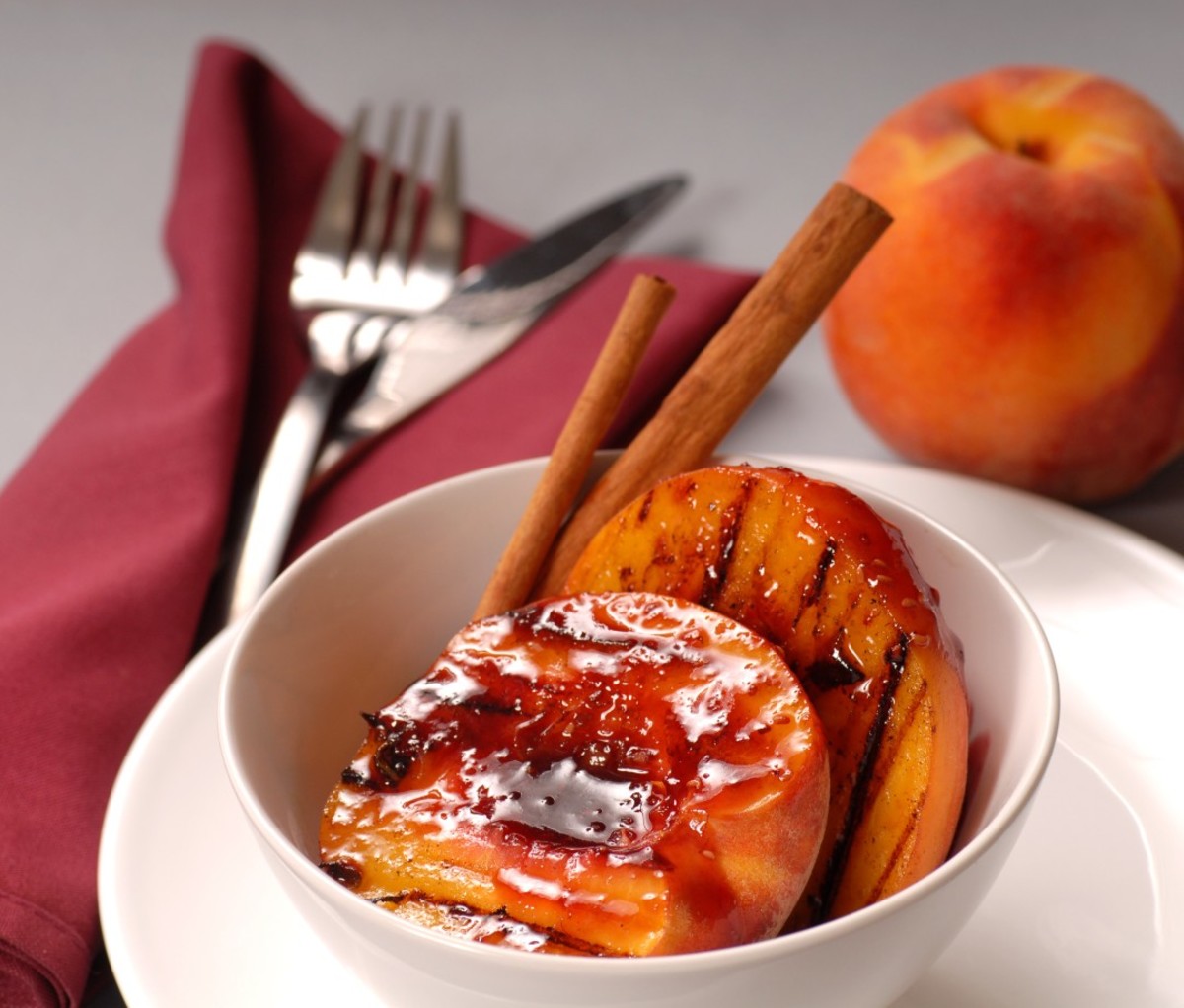 Peaches on cinnamon sticks